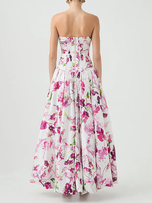 Floral strapless dress on a plain background