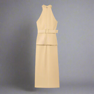Beige sleeveless dress with a belt on a white background