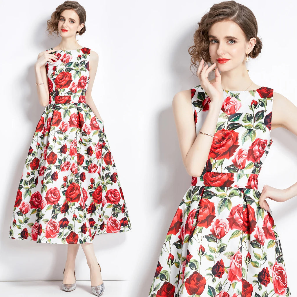 A model wearing a sleeveless, floral print, A-line midi dress with an empire waistline.