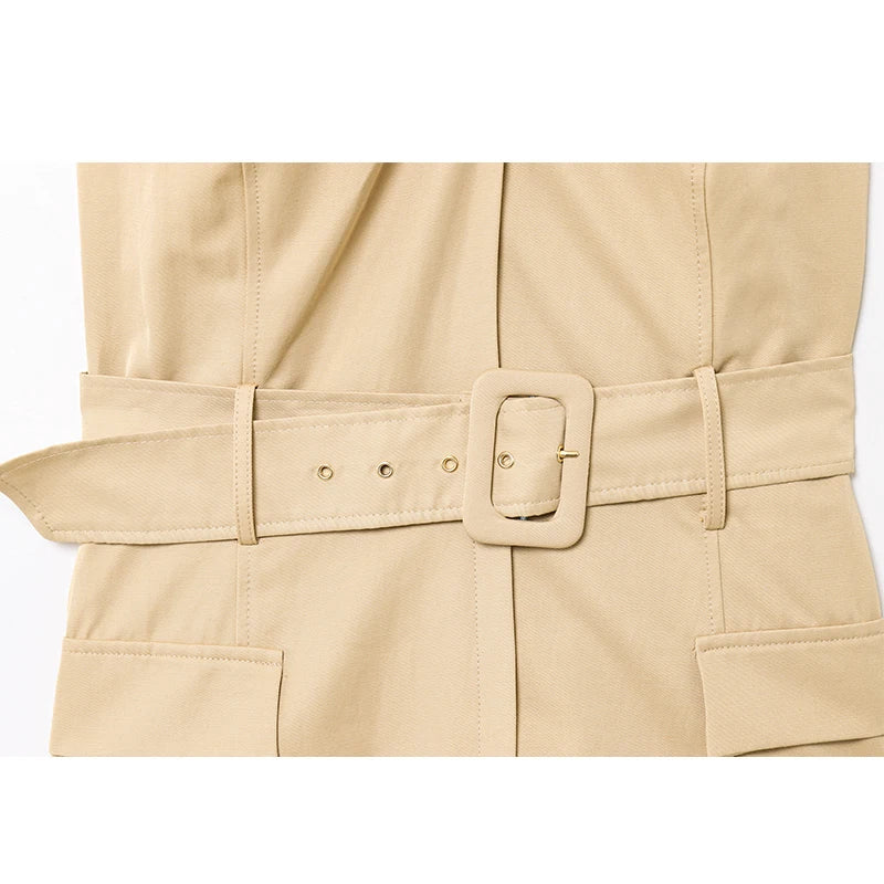 Beige trench coat with a belt and buckle on a white background