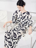 Bright Black & White Pleated Batwing Stretch Dress