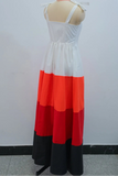 White, red, and black dress on a mannequin against a white background