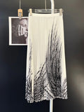 Artistic Top & Pleated Mid-Calf Skirt