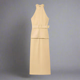 Beige sleeveless dress with a belt on a white background