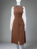 Brown sleeveless dress on a mannequin against a white background
