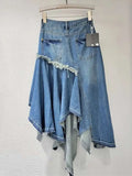 Denim skirt with lace trim on a hanger against a white background