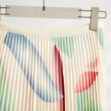 Stretch Pullover Top & High-Waist Pleated Skirt