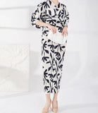 Bright Black & White Pleated Batwing Stretch Dress