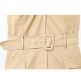 Beige trench coat with a belt and buckle on a white background