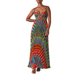 Woman wearing a colorful patterned dress on a white background