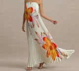 Woman wearing a floral strapless dress with ZJASXMS branding.